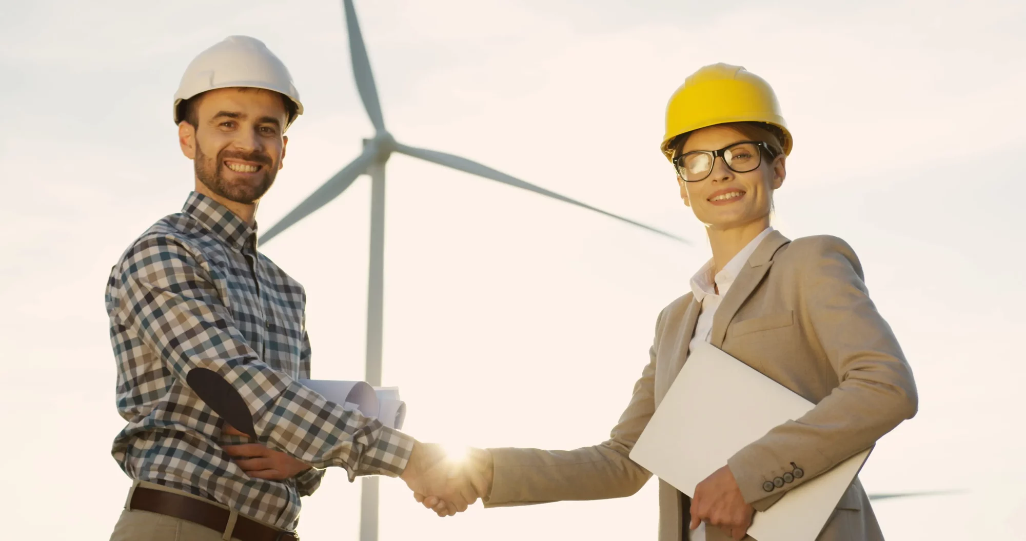 An environmental consultant shaking hands with a client